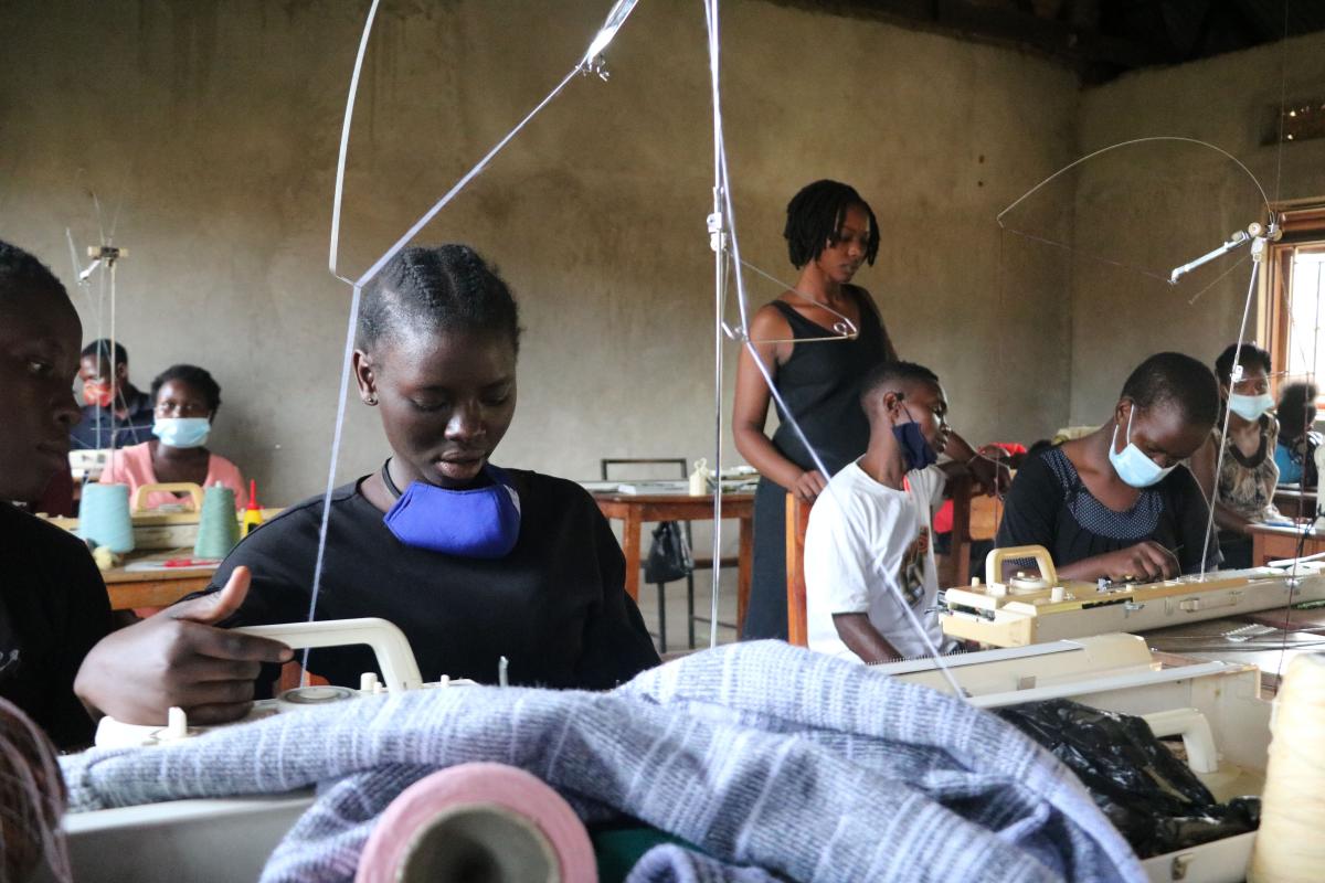 Deaf teenager in Uganda tailors her way into becoming a business owner