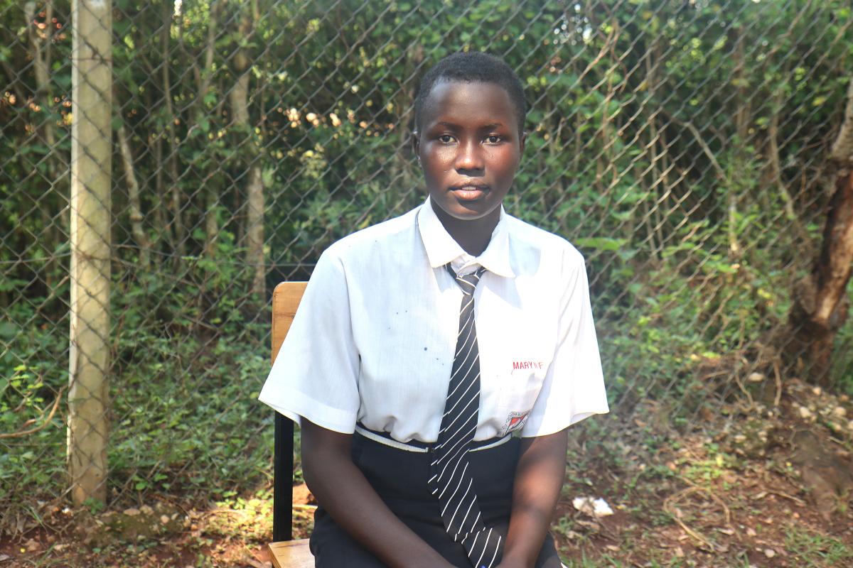 Thatcher, from Uganda encourages peers to remain in school 
